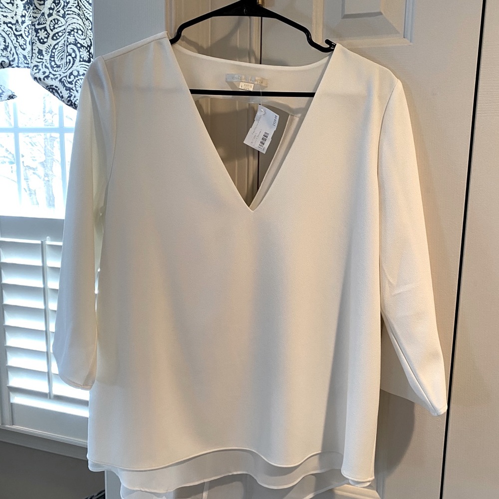 Beautiful white Cooper and Ella top